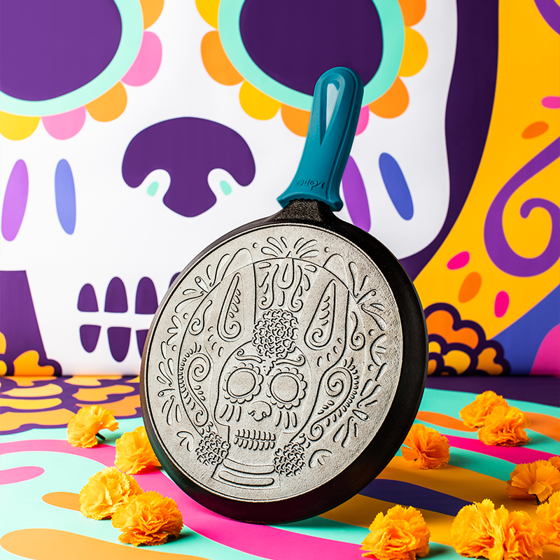 10.5 Inch Seasoned Cast Iron Xolo Sugar Skull Griddle with Deluxe Handle Holder - Lodge